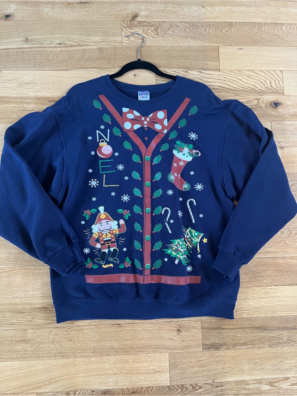Men’s “Noel” Nutcracker Graphic Ugly Christmas Sweatshirt in Navy Size Large
